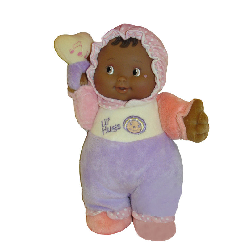 JC TOYS - Lil' Hugs Baby's First Soft Doll, Vinyl Face, Pastel Outfits with Rattle, 12" African-American
